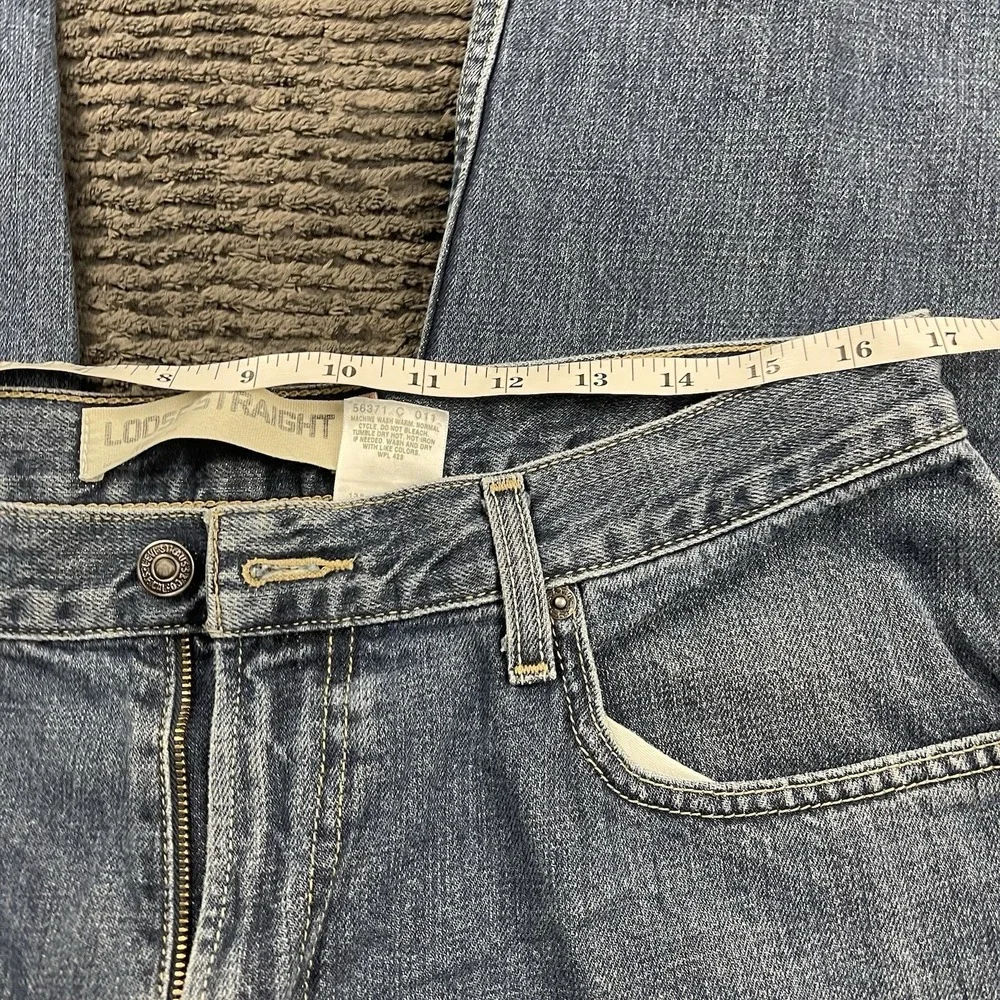 Vintage Levi's 569 Loose Straight Jeans Men's 34x29 Blue Denim Distressed Hem
